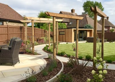 Timber pergolas and stone planting beds In Wrotham Kent