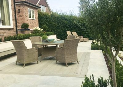 Rattan patio set on a renovated stone garden patio in Kent