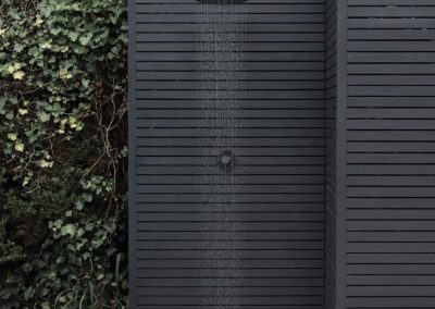 Black timber outdoor pool shower