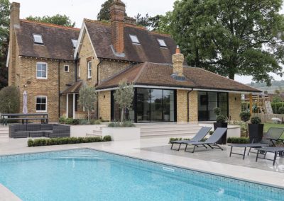 Luxury stone landscaped garden and swimming pool